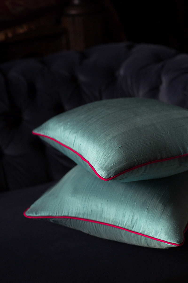 Raw silk armchair cushion in blue. 