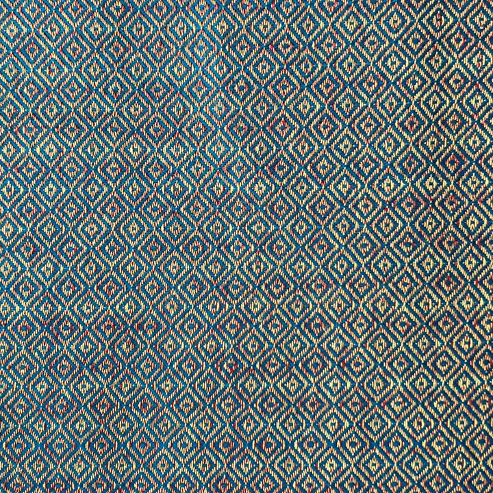 Geometric fabric in blue. 