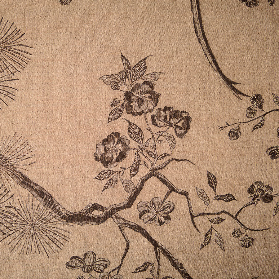 light brown fabric with floral motif 