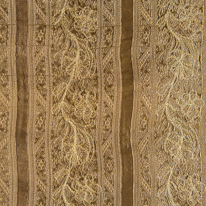 Gold fabric with flower motive. 