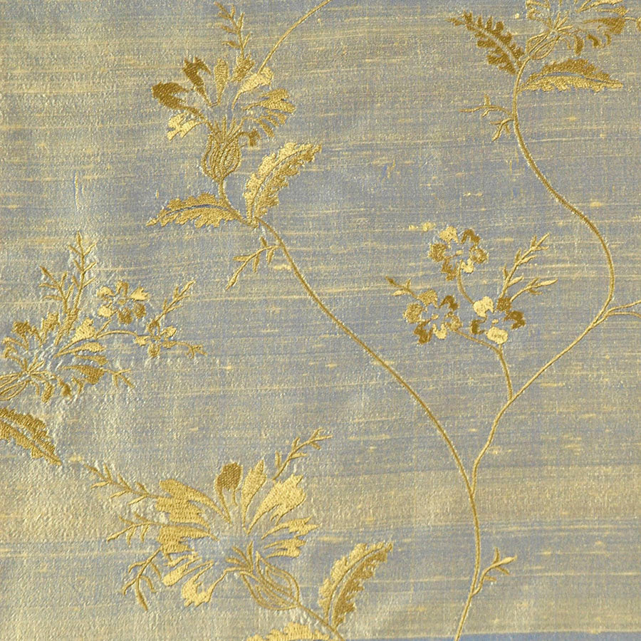 Light blue fabric with gold flowers. 